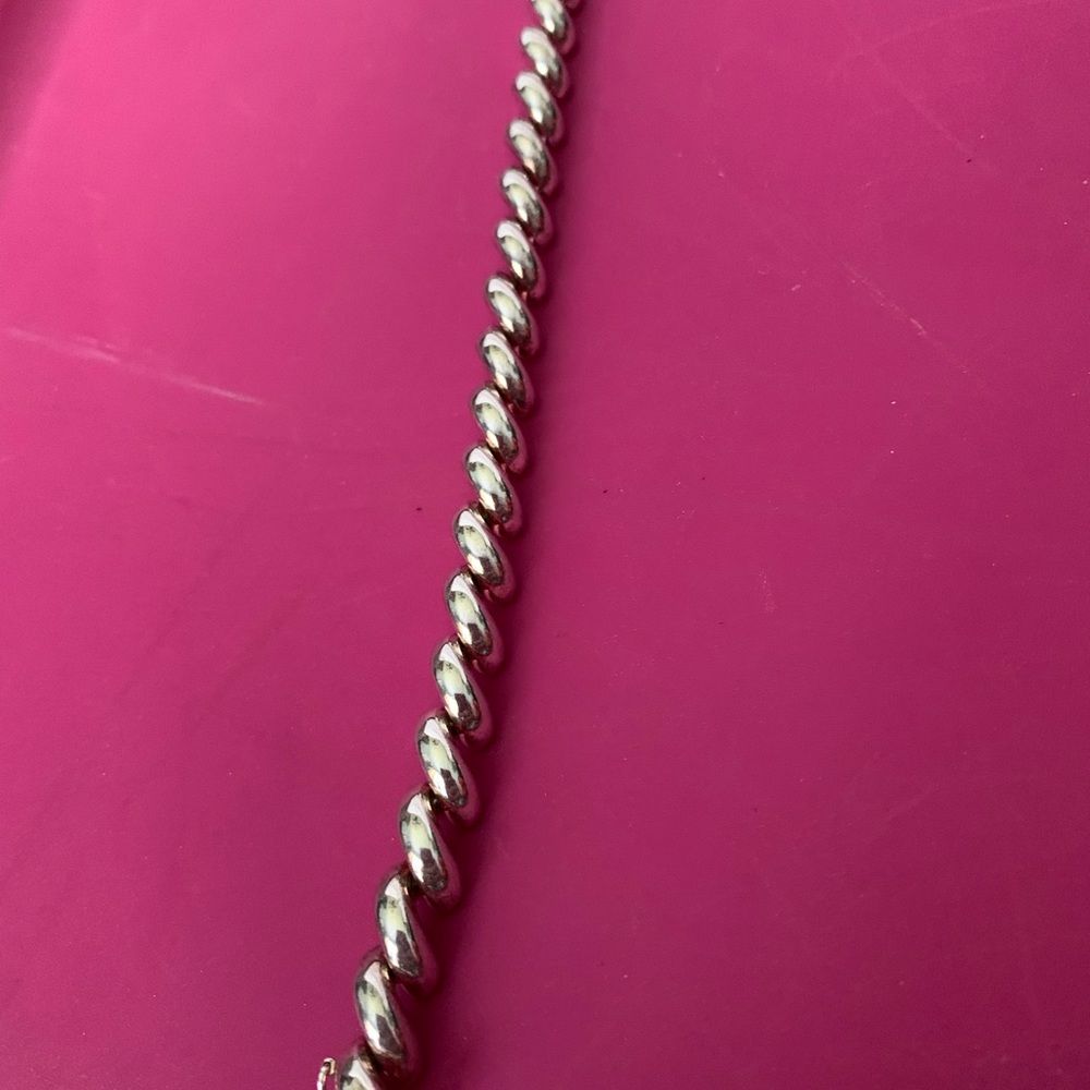 Silver s or rope puff bracelet. Never worn
